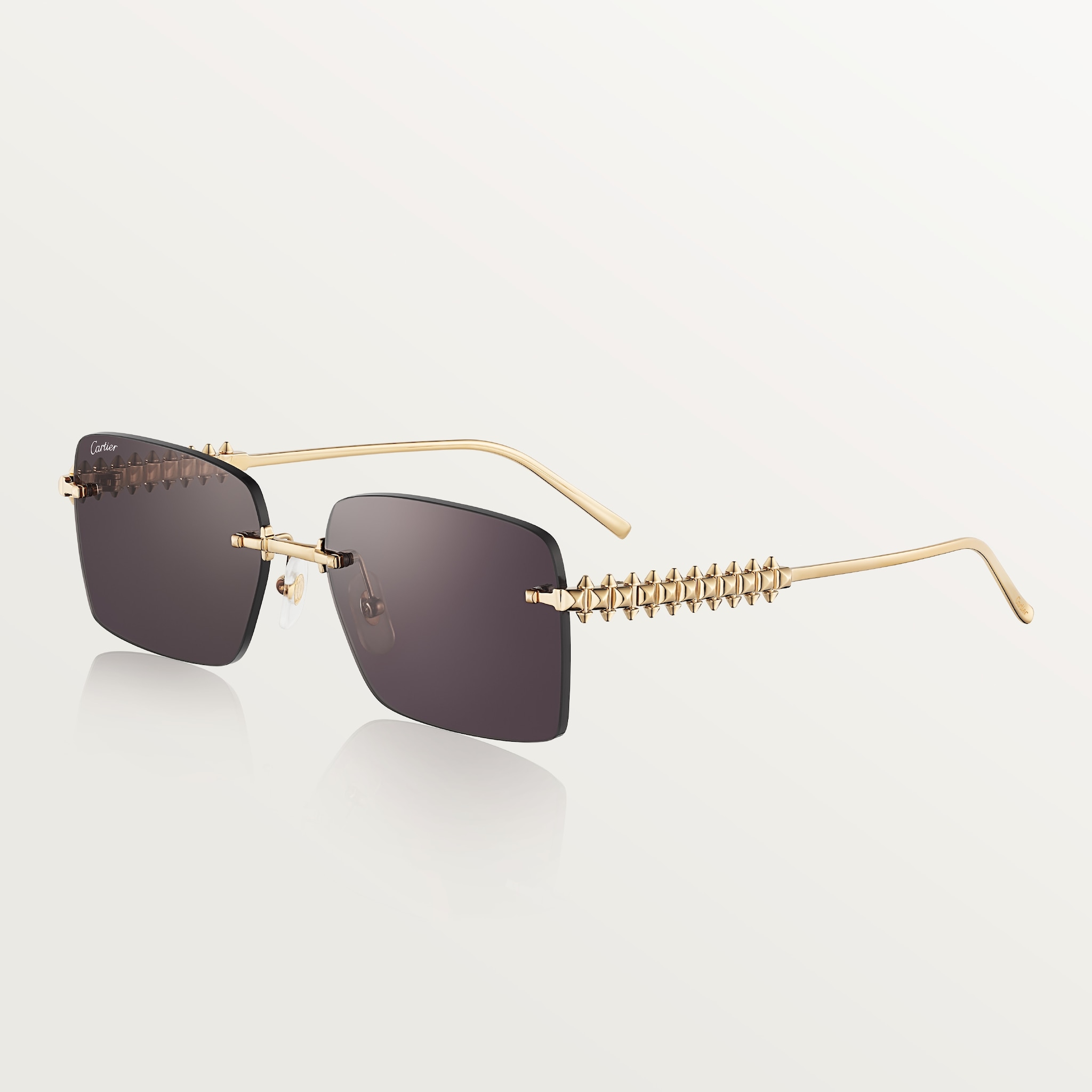 Clash de Cartier SunglassesSmooth golden-finish metal, black lenses