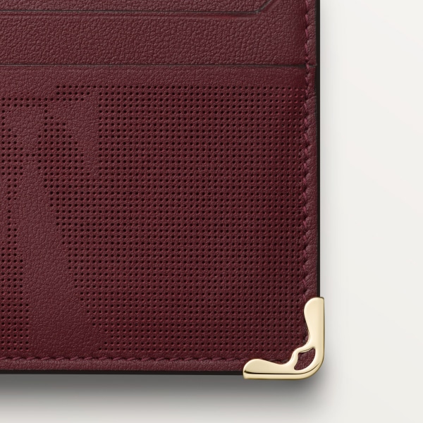 Double card holder, Must de Cartier XL logo perforated burgundy calfskin, golden finish