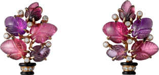 Earrings with engraved stones