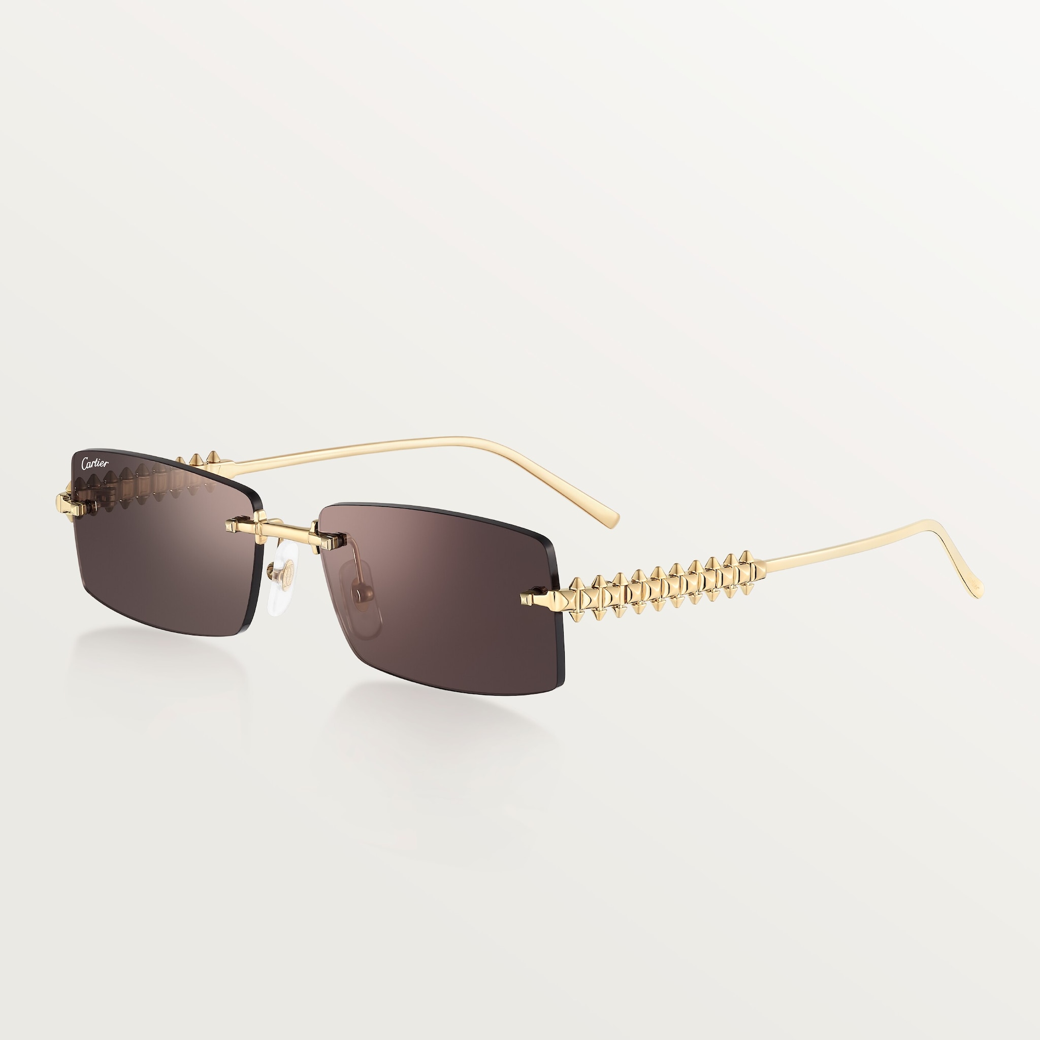 Clash de Cartier SunglassesSmooth golden-finish metal, black lenses