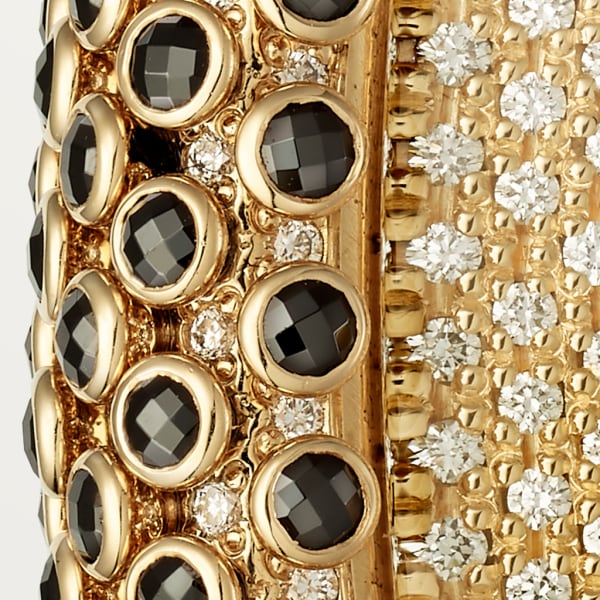 Cartier Libre腕表 中号表款，手动上链机械机芯，18K黄金，钻石，黄色蓝宝石，黑色尖晶石