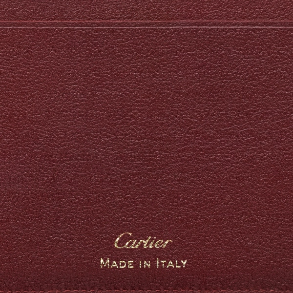 Must de Cartier接裆式通用型皮夹 酒红色小牛皮，镀金装饰