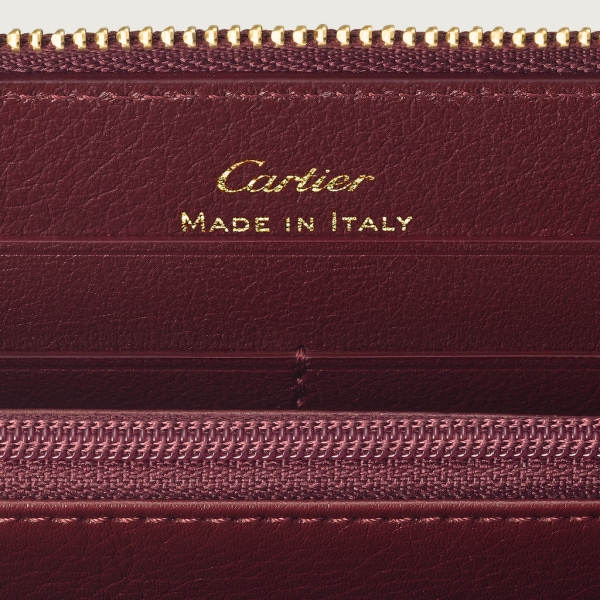 Zipped International Wallet, Must de Cartier Burgundy calfskin, golden finish