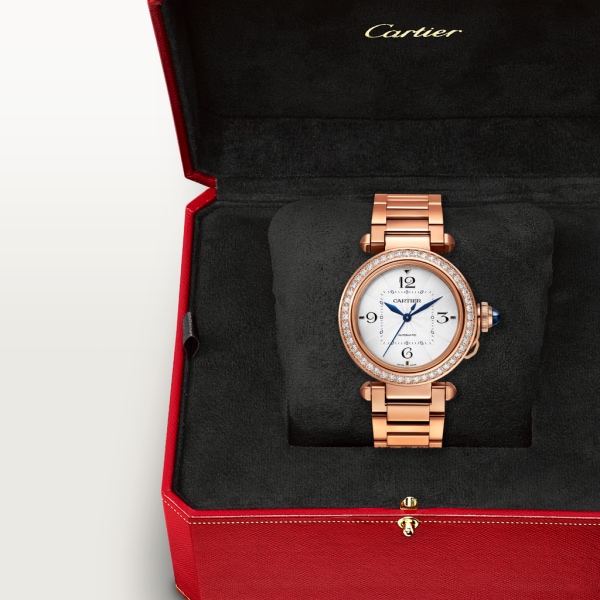 Pasha de Cartier watch 35 mm, automatic movement, rose gold, diamonds, interchangeable metal and leather straps