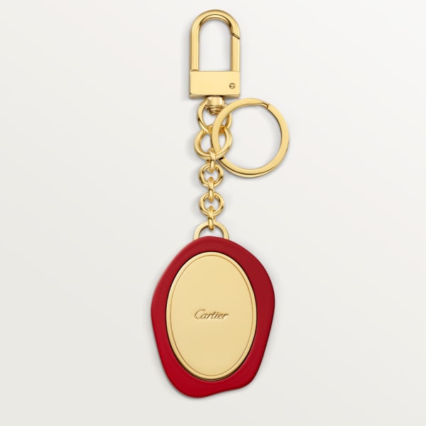 Diabolo de Cartier key ring with wax seal motif Lacquered golden-finish metal