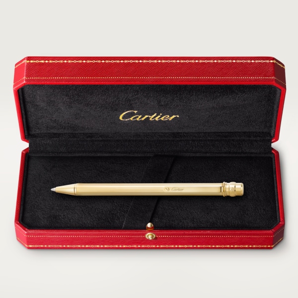 Santos de Cartier ballpoint pen Small model, engraved metal, gold finish