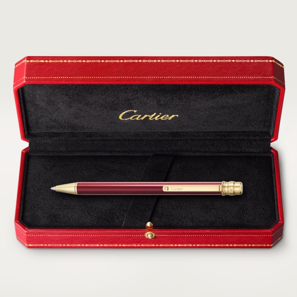 Santos de Cartier ballpoint pen Small model, burgundy lacquer, gold finish