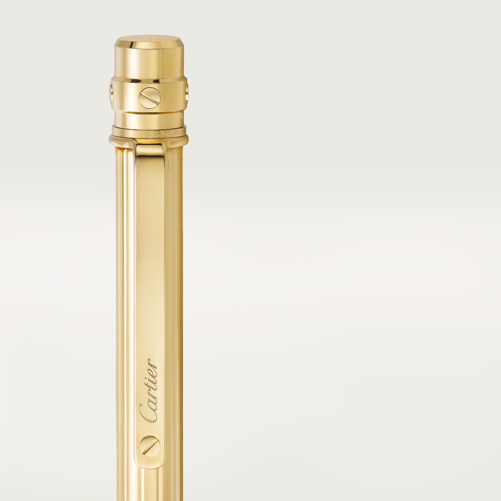 Santos de Cartier ballpoint penSmall model, engraved metal, gold finish