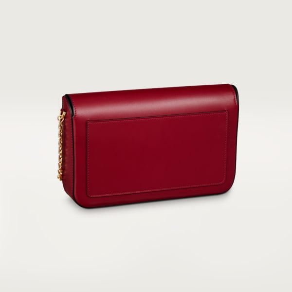 Small model chain bag, C de Cartier Cherry red calfskin, gold and cherry red enamel finish