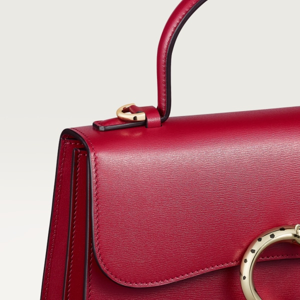 Top handle bag small model, Panthère de Cartier Cherry red calfskin, golden finish