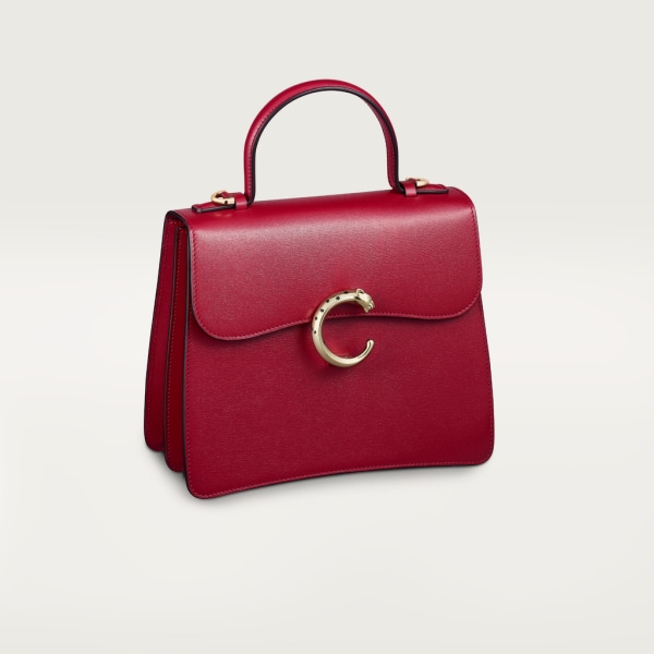 Top handle bag small model, Panthère de Cartier Cherry red calfskin, golden finish