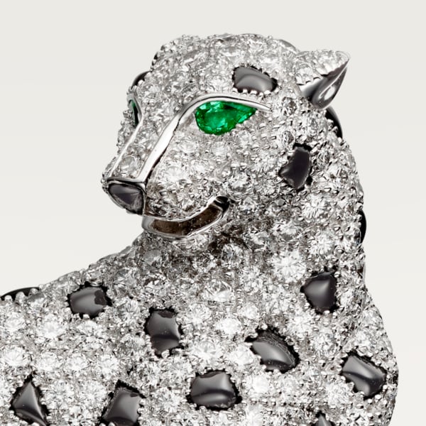 Panthère de Cartier brooch White gold, emeralds, onyx, diamonds