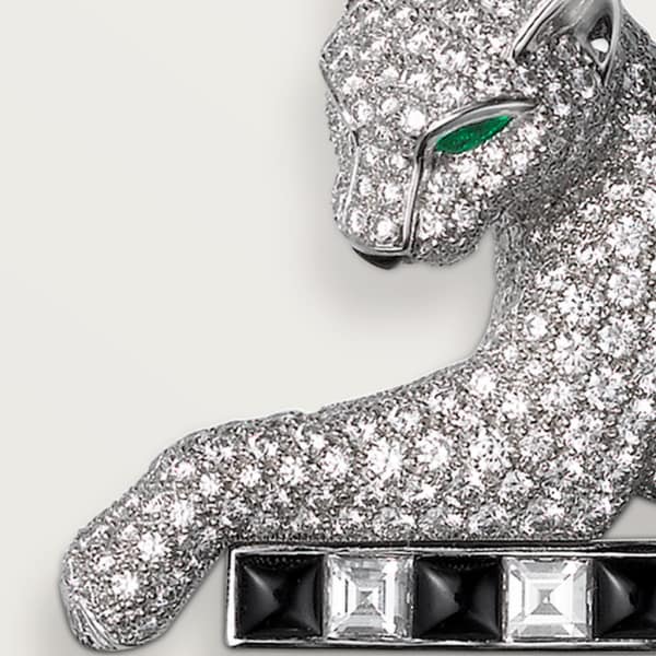 Panthère de Cartier brooch White gold, emeralds, onyx, diamonds.