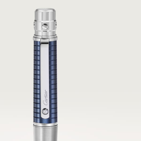 Santos de Cartier ballpoint pen Large model, brushed and engraved striated metal covered with blue PVD, palladium finish