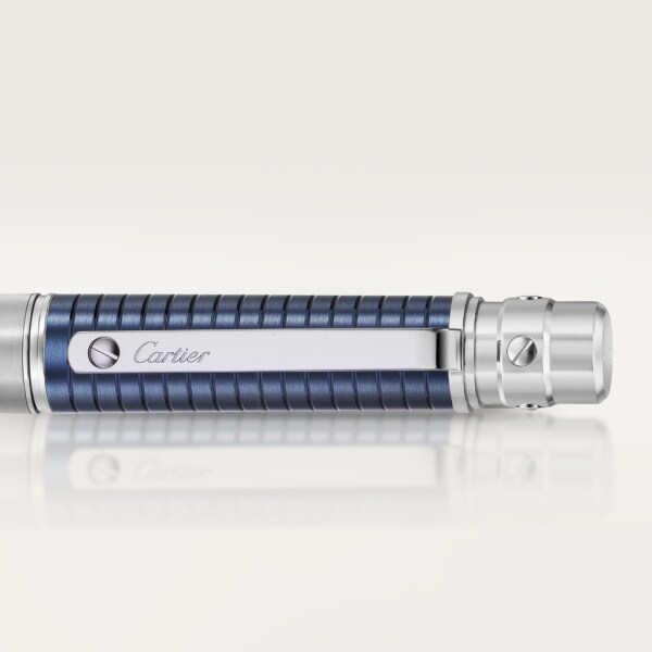 Santos de Cartier ballpoint pen Large model, brushed and engraved striated metal covered with blue PVD, palladium finish