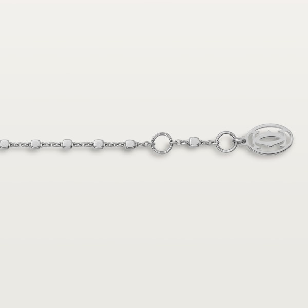Panthère de Cartier bracelet, on chain, semi-paved White gold, emeralds, diamonds