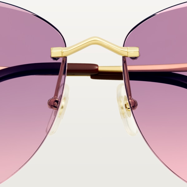 Panthère de Cartier Sunglasses Smooth golden-finish metal, graduated pink-purple lenses with golden flash