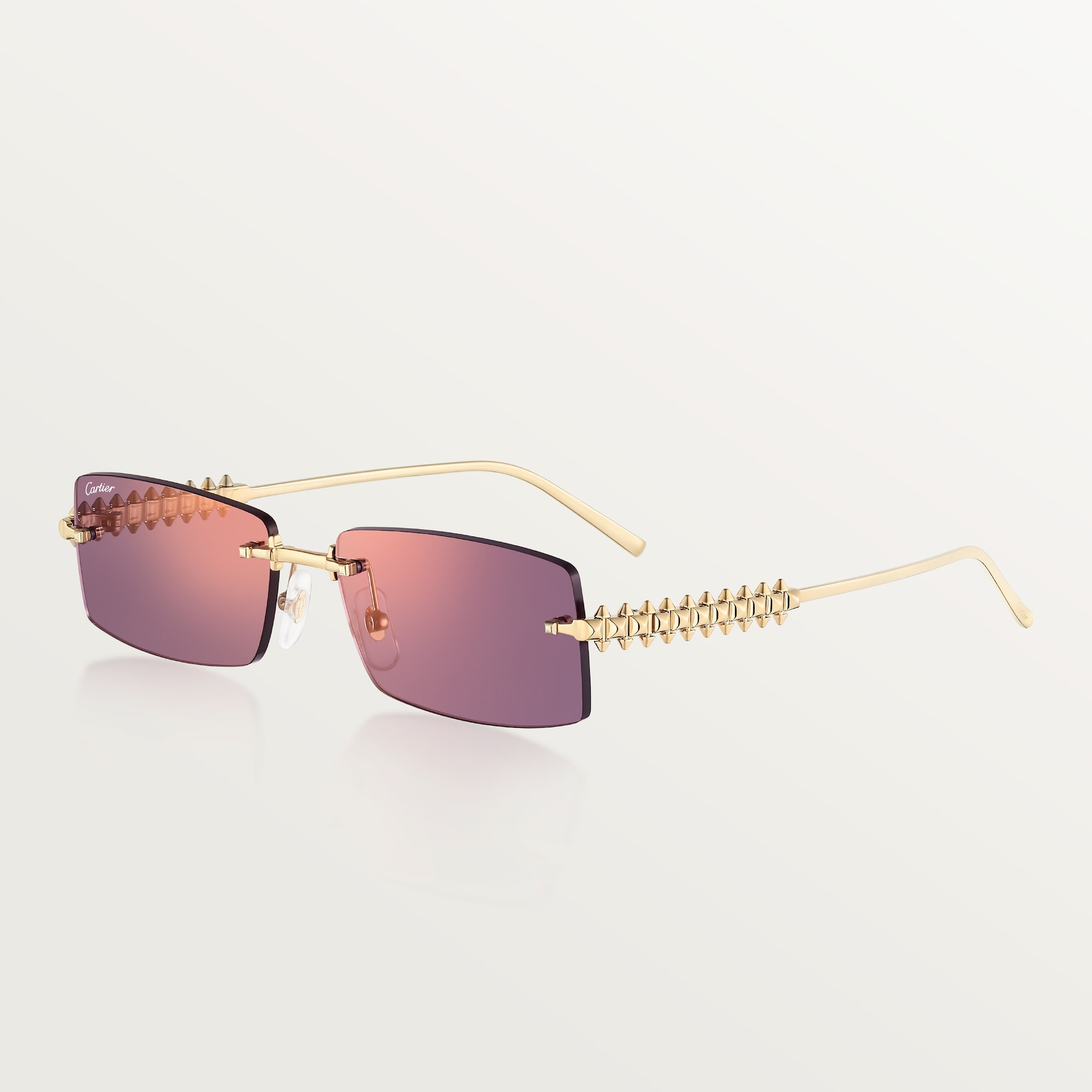 Clash de Cartier SunglassesSmooth golden-finish metal, purple lenses