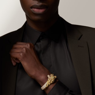 Faune et Flore de Cartier bracelet, yellow, orange and brown diamonds, paved  Yellow gold, onyx, emeralds, yellow diamonds, orange diamonds, brown diamonds, diamonds