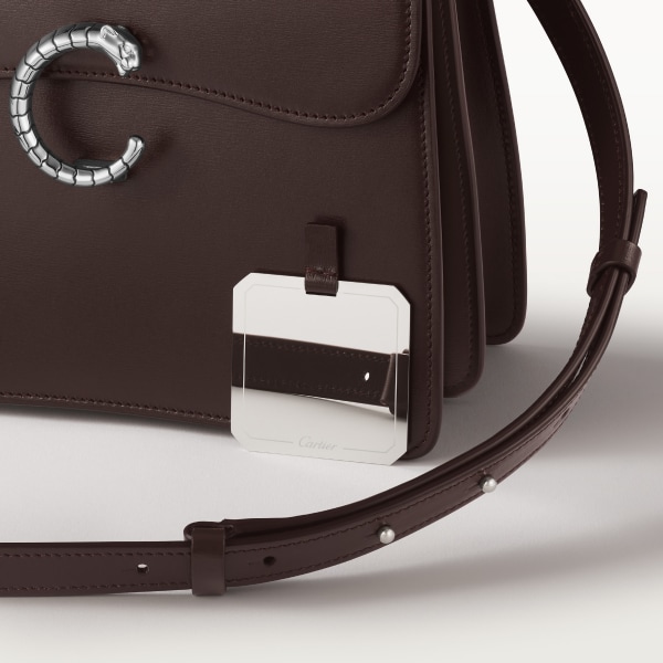 Top handle bag small model, Panthère de Cartier Tonka brown calfskin, palladium finish, zebra motif