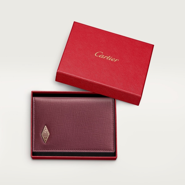 Four-credit card holder, Cartier Losange Burgundy grained calfskin, golden finish and burgundy enamel