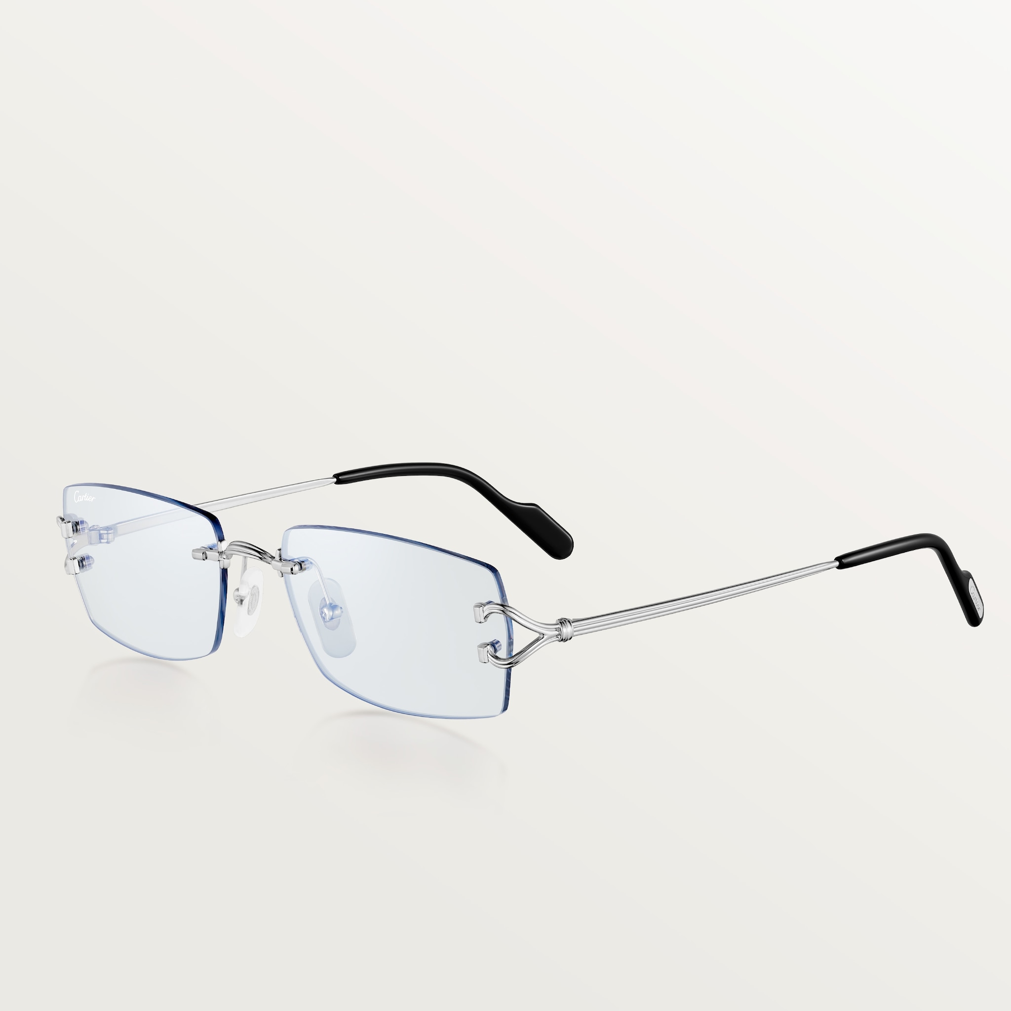 Sunglasses, Classic C de Cartier motifSmooth platinum-finish metal, blue photochromic lenses