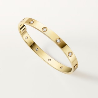 <span class='lovefont'>A </span> bracelet, classic model, 10 diamonds, one screw closure Yellow gold, diamonds