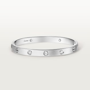 <span class='lovefont'>A </span> bracelet, classic model, brushed, 4 diamonds White gold, brushed finish, diamonds