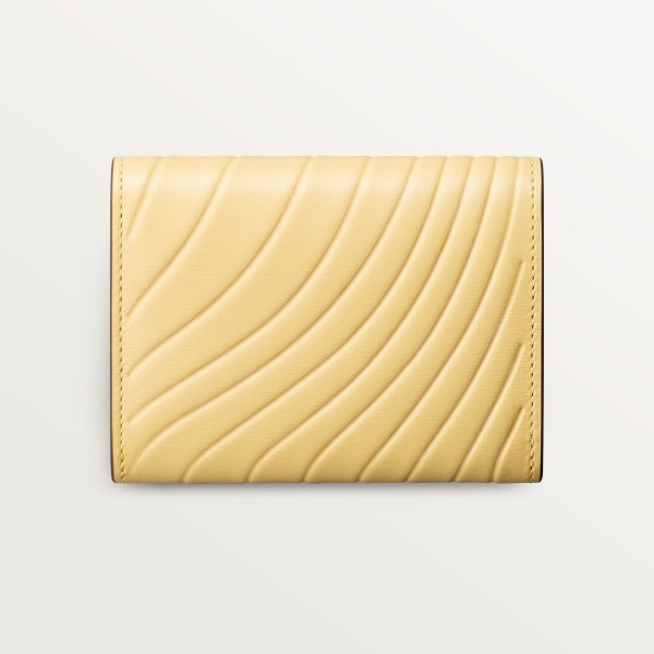 Mini wallet, Panthère C de Cartier Mimosa yellow calfskin, embossed with Cartier signature motif, palladium finish