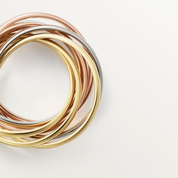 Trinity ring, seven rows  White gold, yellow gold, rose gold