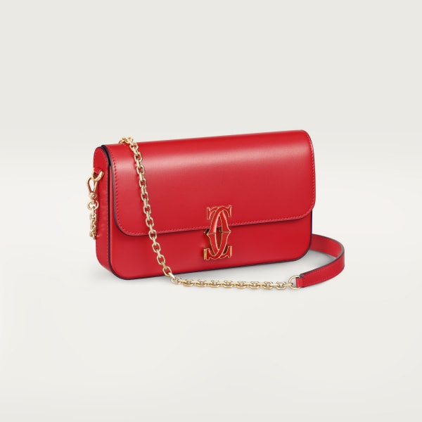 Mini model chain bag, C de Cartier Red calfskin, golden finish and red enamel