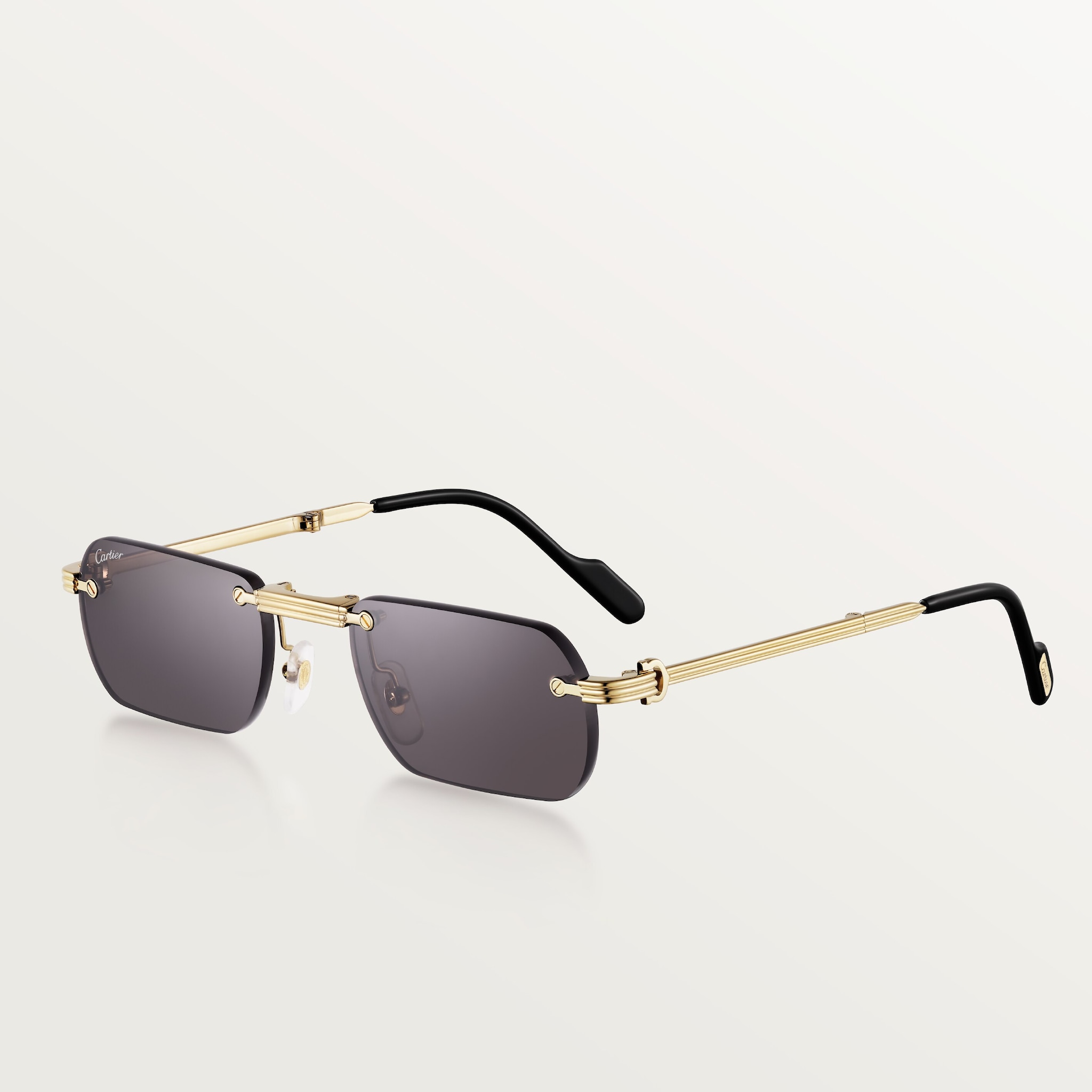 Première de Cartier sunglassesSmooth golden-finish metal, grey lenses