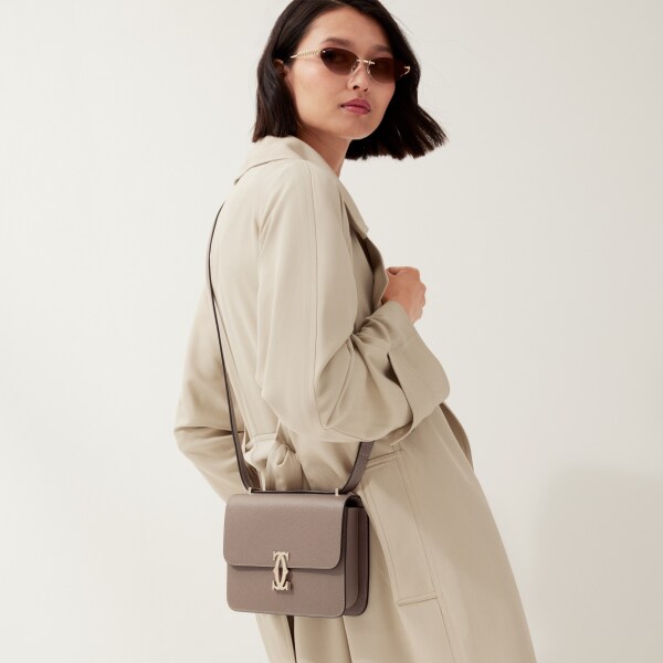 Mini bag, C de Cartier Clay-coloured textured calfskin, golden finish