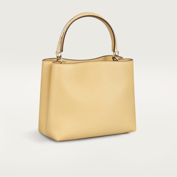Small model handle bag, Panthère Double de Cartier Mimosa yellow calfskin, golden finish