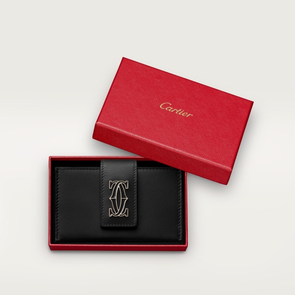 Accordion card holder, C de Cartier Black calfskin, golden finish and black enamel