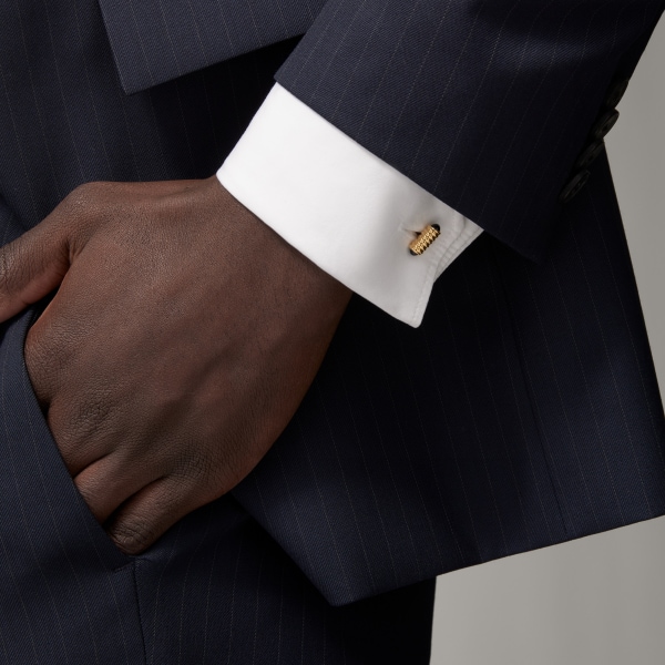 Cufflinks with spring motif Yellow gold, onyx