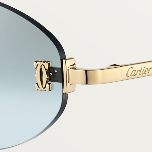 C de Cartier Sunglasses Smooth golden-finish metal, light blue lenses