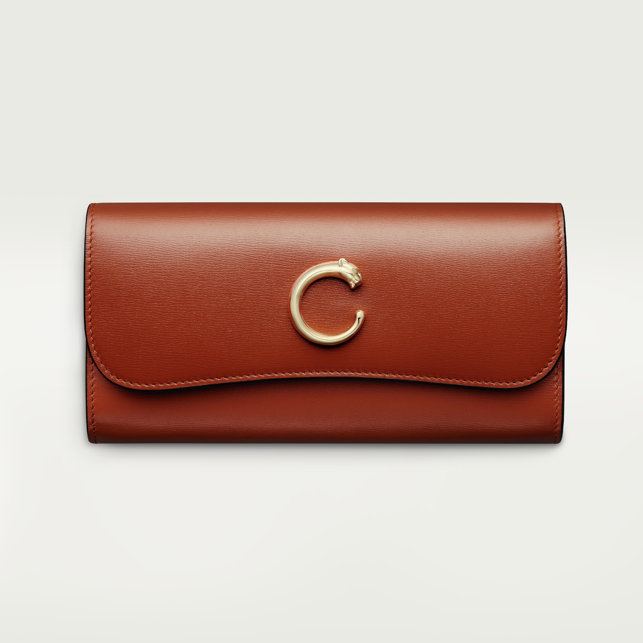 International wallet with flap, Panthère de Cartier
Chestnut calfskin, golden finish