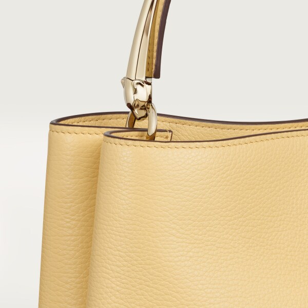 Small model handle bag, Panthère Double de Cartier Mimosa yellow calfskin, golden finish