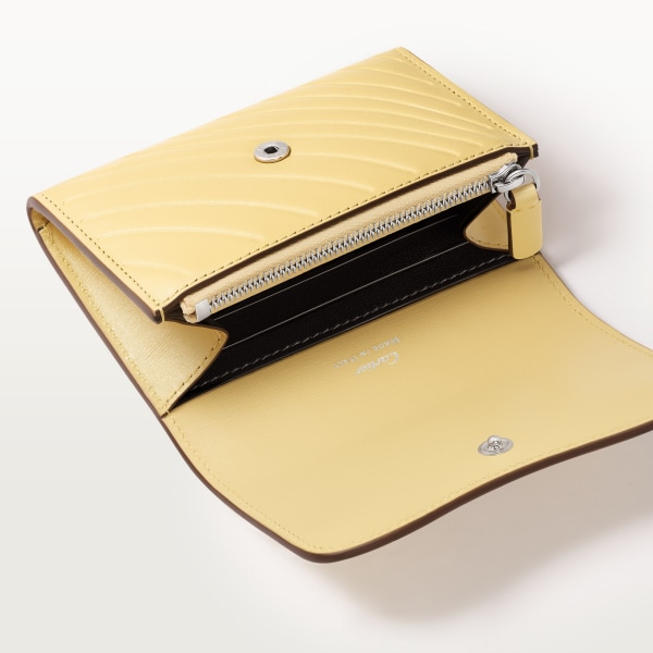 Mini wallet, Panthère C de Cartier Mimosa yellow calfskin, embossed with Cartier signature motif, palladium finish