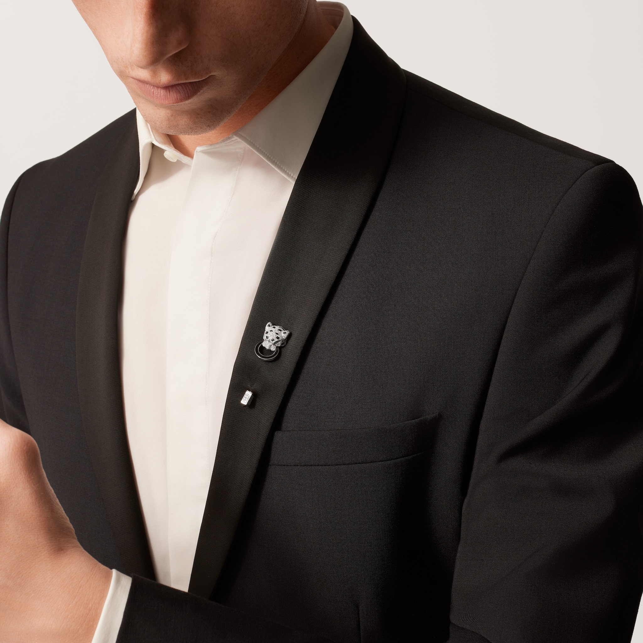 Panthère de Cartier tie pinWhite gold, emeralds, onyx, diamonds