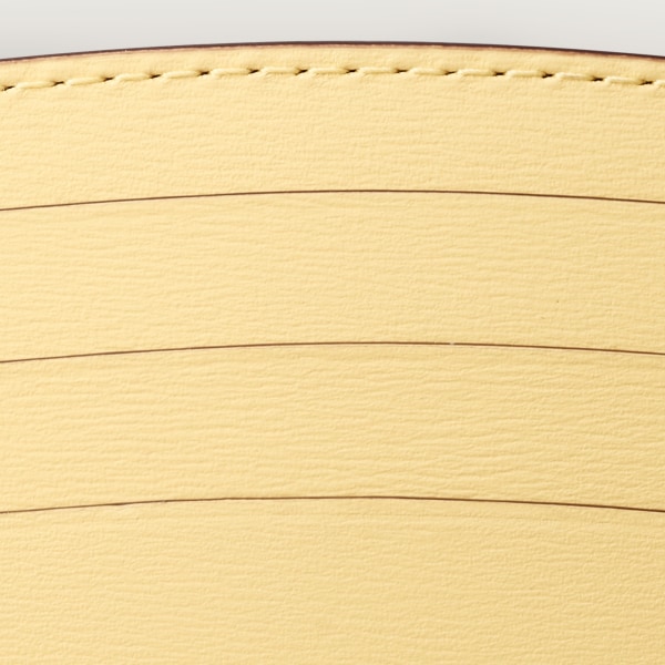 Simple card holder, Panthère C de Cartier Mimosa yellow calfskin, embossed with Cartier signature motif, palladium finish