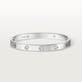 <span class='lovefont'>A </span> bracelet, classic model, 4 diamonds, one screw closure White gold, diamonds