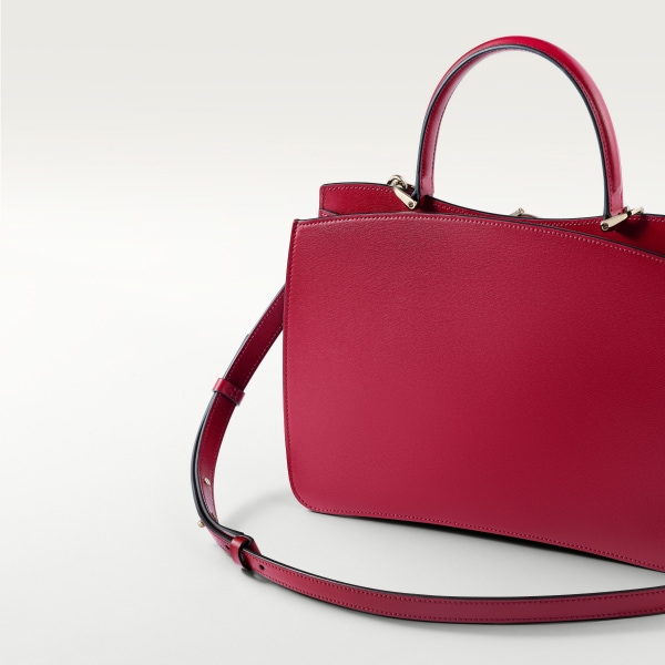 Top handle bag small model, Panthère de Cartier Cherry red calfskin, golden finish