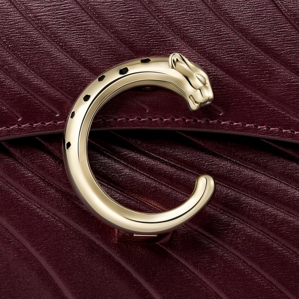 Small model handle bag, Panthère C de Cartier Grape calfskin, embossed Cartier signature motif, golden finish