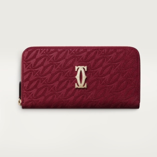 International zipped wallet, C de Cartier Cherry red textured calfskin, embroidery, golden finish