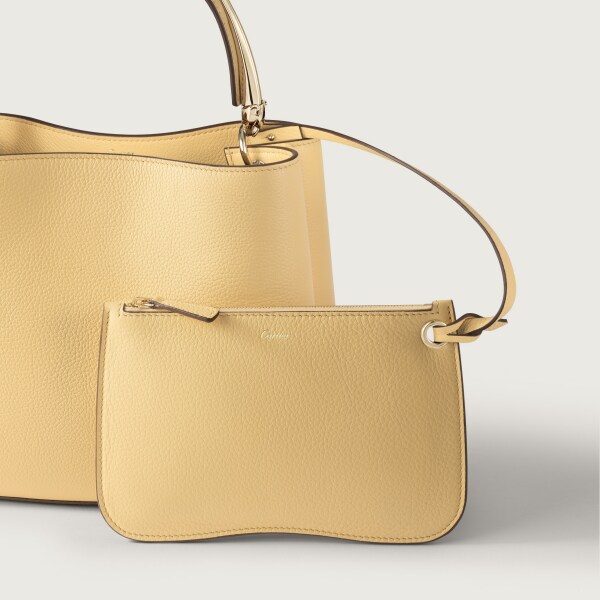 Small model handle bag, Panthère Double de Cartier Mimosa yellow calfskin, golden finish