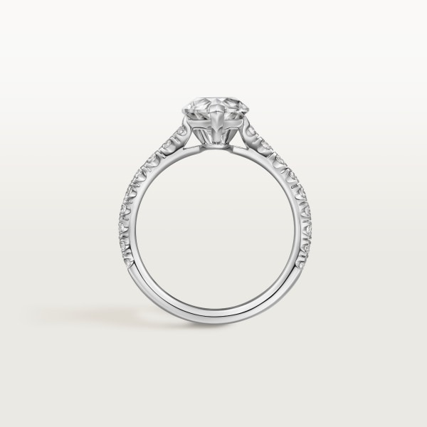 1895 solitaire, pear-cut diamond, paved  Platinum, diamonds
