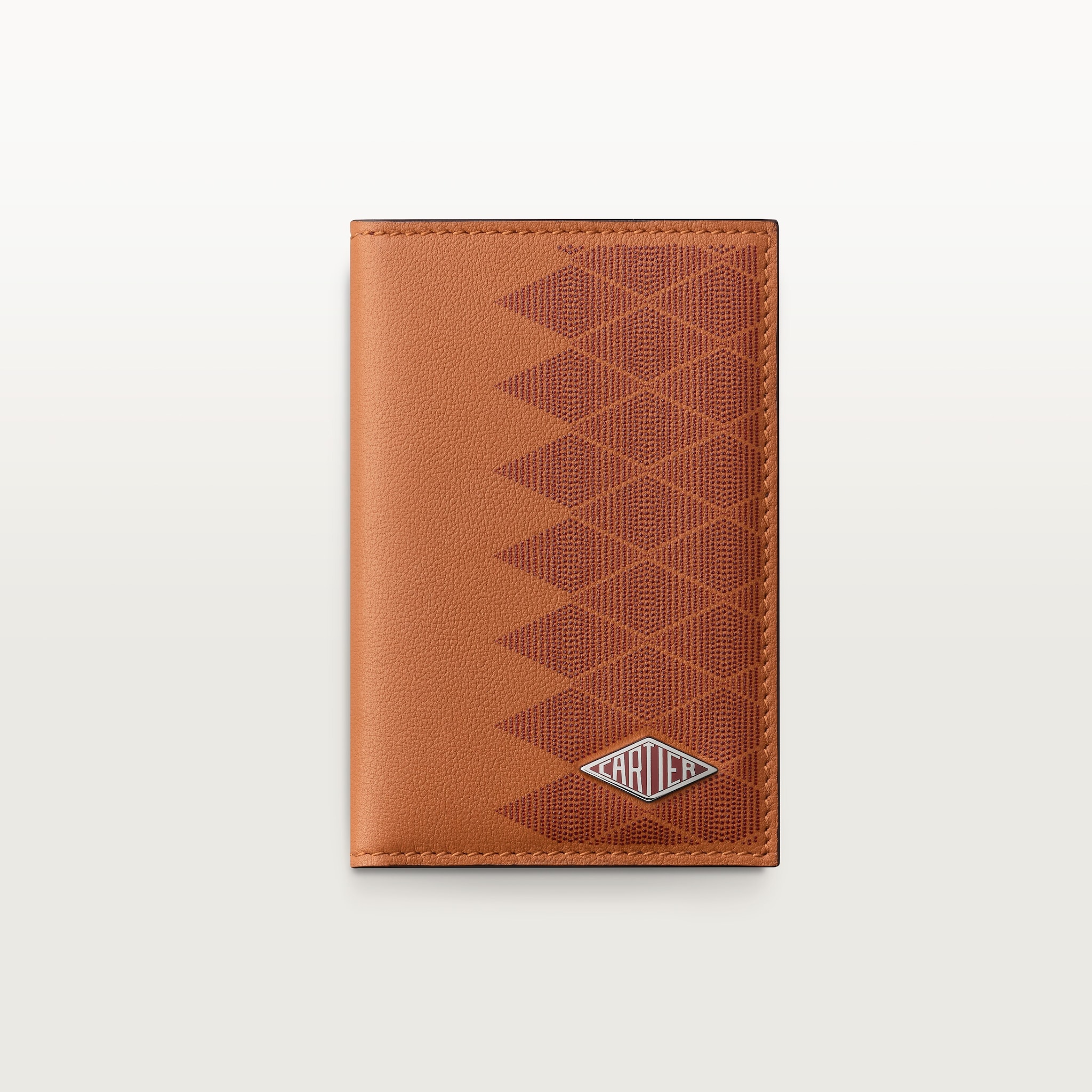Four-credit card holder, Cartier LosangeCaramel-coloured and burgundy calfskin with diamond dots print, palladium finish and burgundy enamel