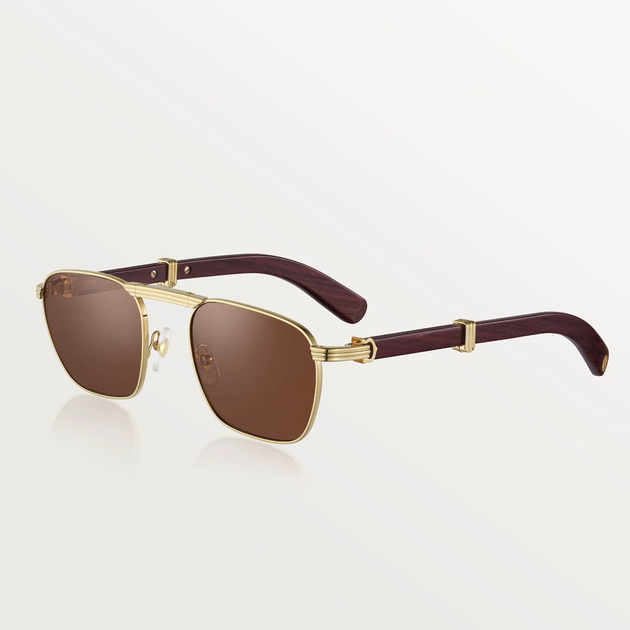 Première de Cartier sunglassesSmooth golden-finish metal, brown lenses